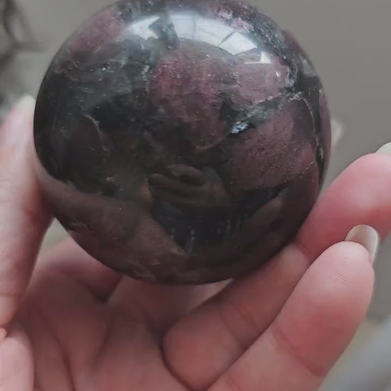 Garnet Sphere with Astrophylite / Arfvedsonite 6.5cm