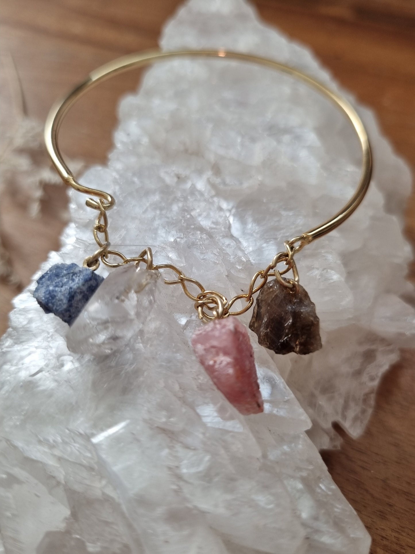 Crystal hoop gold bracelet with raw smoky quartz, rose quartz, clear quartz and sodalite