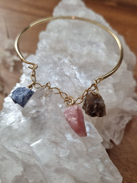 Crystal hoop gold bracelet with raw smoky quartz, rose quartz, clear quartz and sodalite