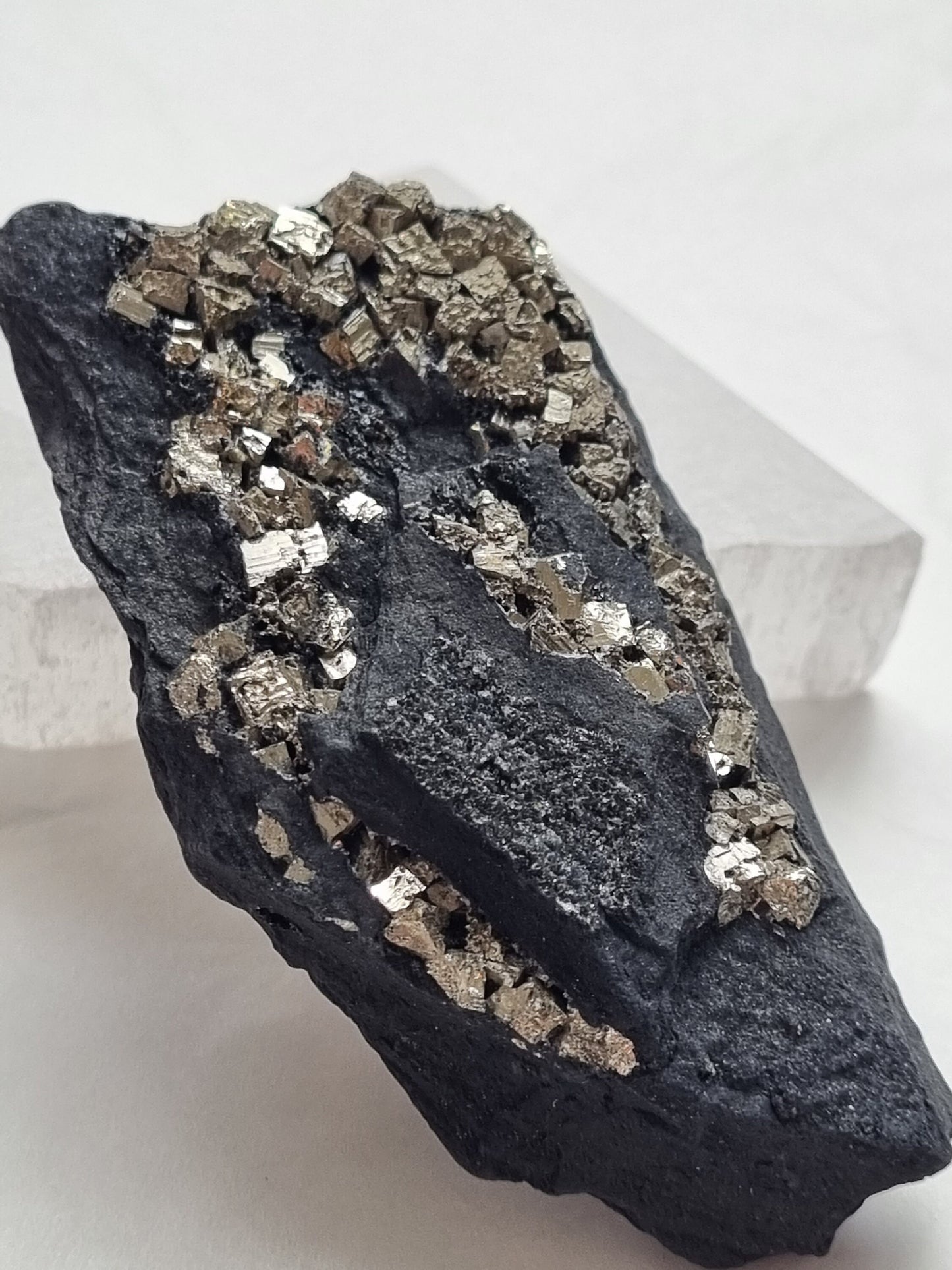 Pyrite on Basalt / Raw crystals / Crystals with pyrite inclusions