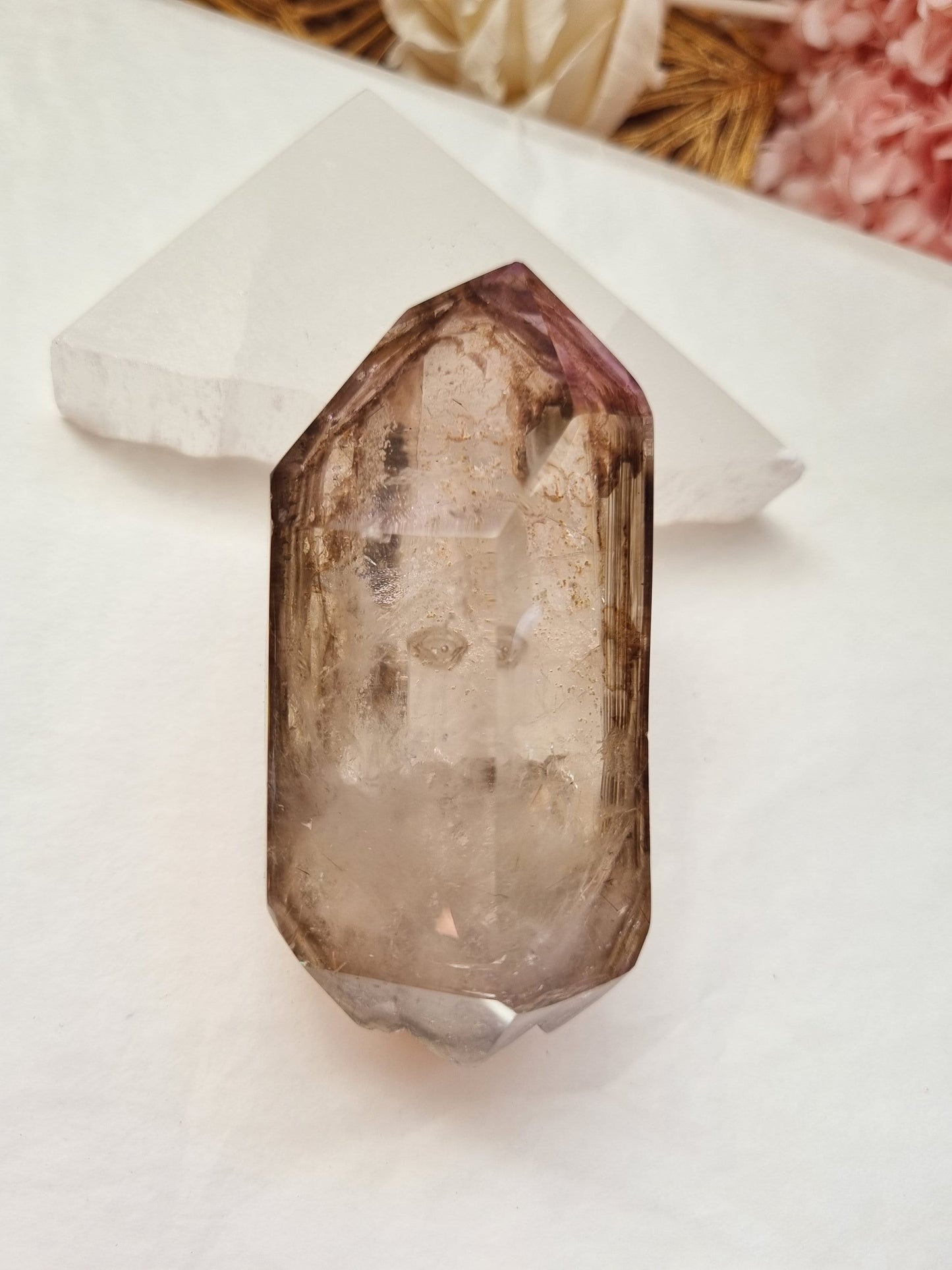 Smoky manifest enhydro with amethyst inclusions